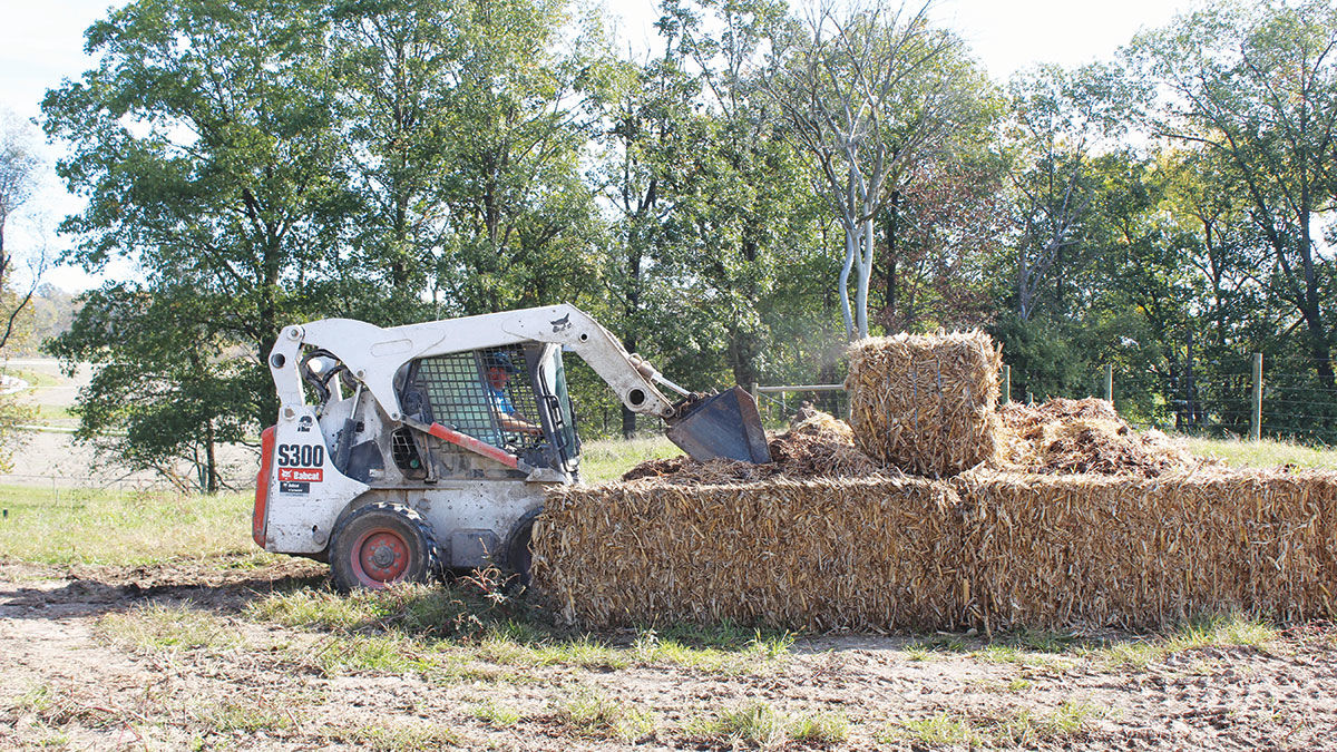 Temporary composting bins made of hay bales